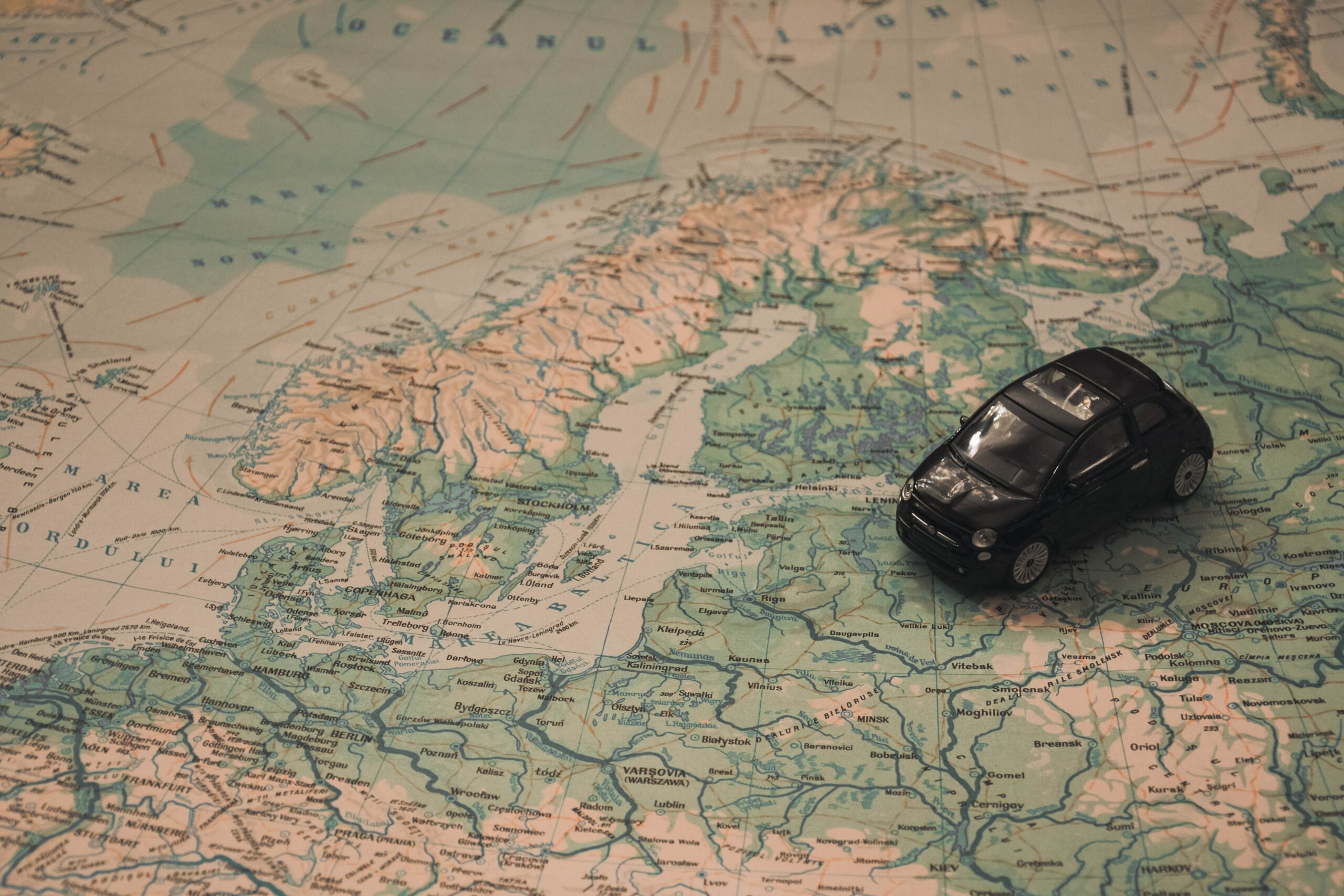 Black car on map of Europe